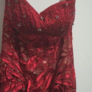 *Brand:** Aspeed USA (High quality formal wear).
*   Aspeed Burgundy Beaded Gown